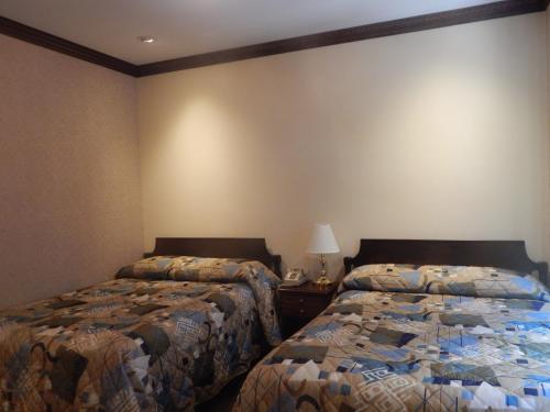 Hotel 31 Extended Stay - Accommodation and Room Amenities