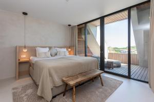 Dune Hotel Tien Torens - About Your Stay