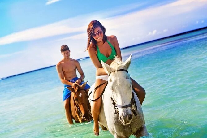 Dunns River Falls, Blue Hole, Bamboo Rafting, Horseback Combo