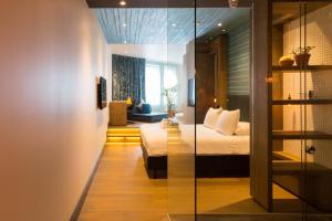 Manzos Suites - About Your Stay