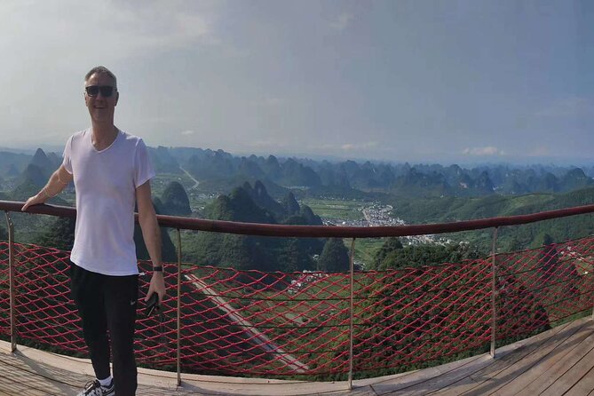 1-Day Tour:Yangshuo Yulong Bamboo Boat and Ruyi Peak Cable Car From Guilin Hotel - Tour Overview