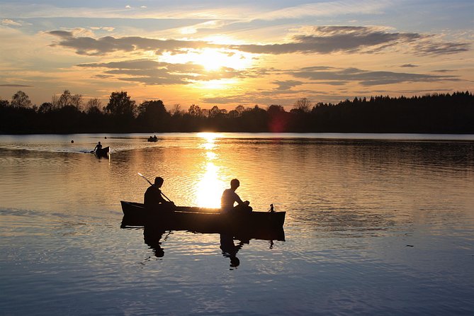 Canoeing Under the Midnight Sun - Navigating the Serene Waters