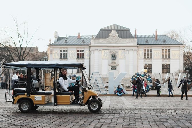 Krakow City Tour by Electric Car With Optional Old Synagogue or Town Hall Ticket - Tour Overview