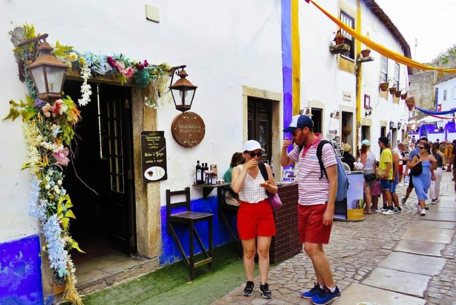 Lisbon: Transfer to Porto With Stops in Óbidos-Nazaré-Aveiro