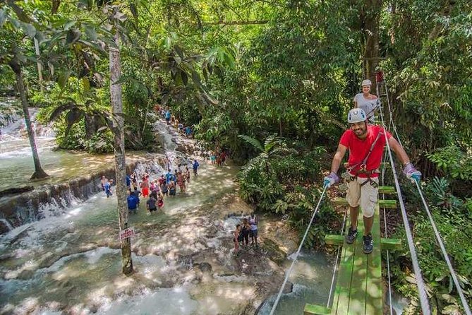 Private Round Trip Transfer to Dunns River Climb and Zipline Over the Falls!