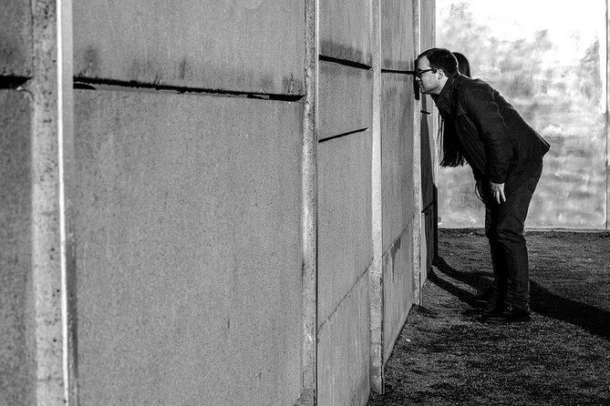 Cold War Berlin Behind the Wall Walking Guided Tour - Berlin Wall: Symbol of Oppression