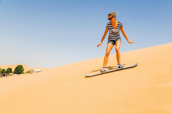Morning Dune Bashing With Sand Boarding And Camel Ride in Red Dunes Desert
