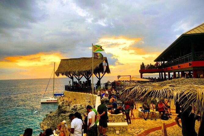 Negril Beach Day Out With Parasailing and Ricks Cafe Activity