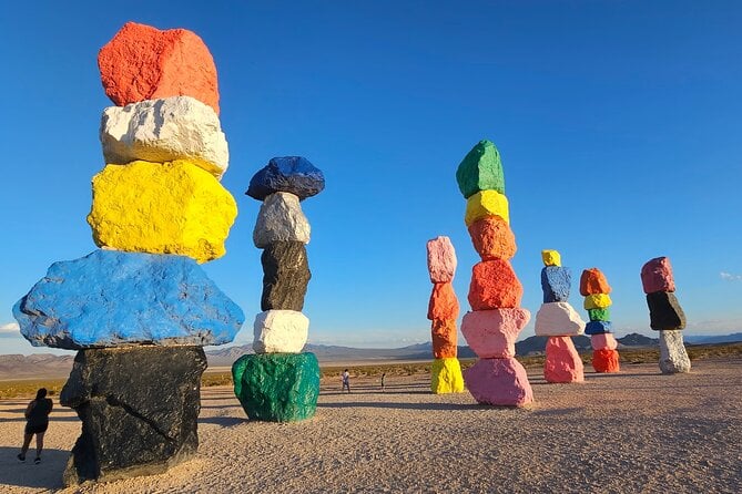 Grand Canyon West Rim, Hoover Dam Stop and 7 Magic Mountains Tour - Frequently Asked Questions