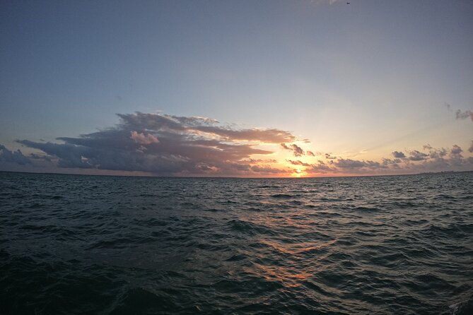 Catamaran Plus and Parasail Over Cancun Bay