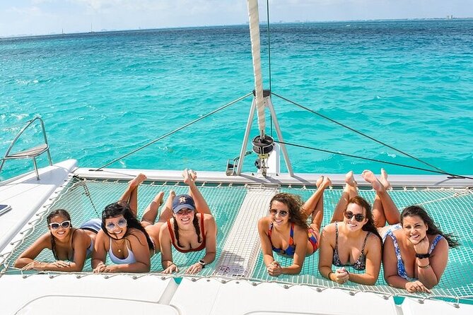 Catamaran to Isla Mujeres Only for Adults - Buffet & DJ at the Beach Club - Catamaran Experience Overview