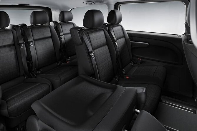 Arrival Transfer From Mykonos Airport JMK to Mykonos by Minivan - Service Overview