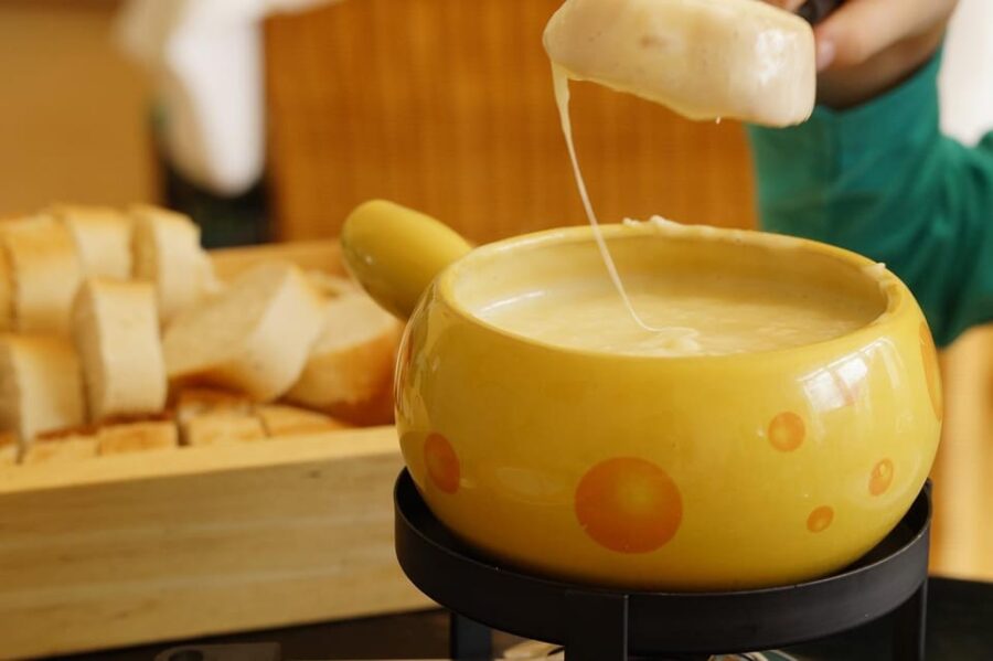 Basel: Cheese Fondue, Wine and Dessert Culinary Experience - Experience Overview