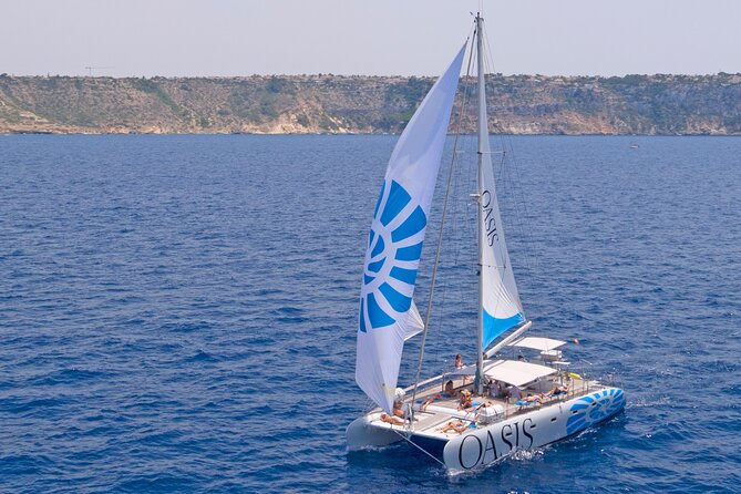 Catamaran Sailing in Mallorca Through the Bay of Palma With BBQ
