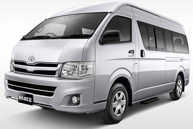 Private RoundTrip Transfer: Donald Sangster Airport MBJ to Kingston by Minivan