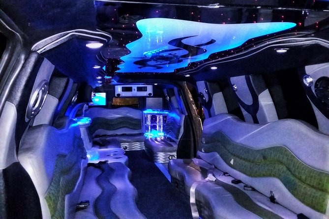 Woodbury Commons Shopping in Escalade White Limousine - Pickup and Confirmation