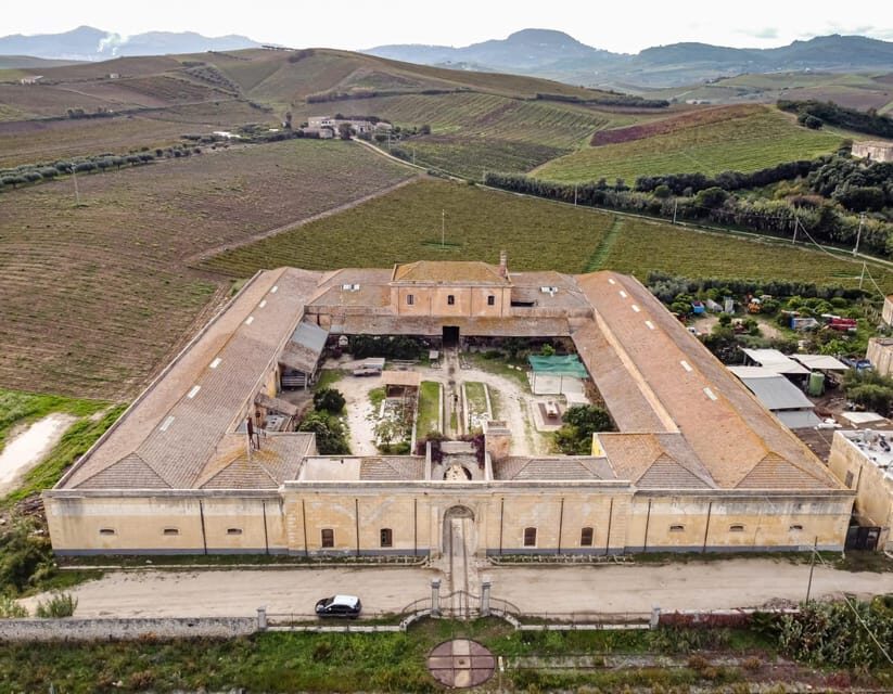Historical Baglio Florio Adamo Tour With Wine Tasting - Exploring the Historic Baglio Florio