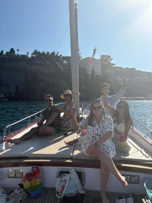 Sorrento: Gozzo Boat Coastal Cruise With Swim and Limoncello - Itinerary and Key Highlights