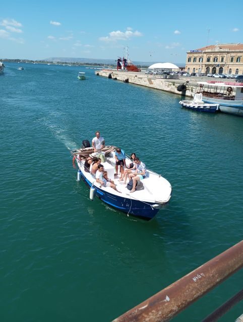 Syracuse: Boat Tour Ortigia Island,Seacaves and Explanations - Itinerary Highlights
