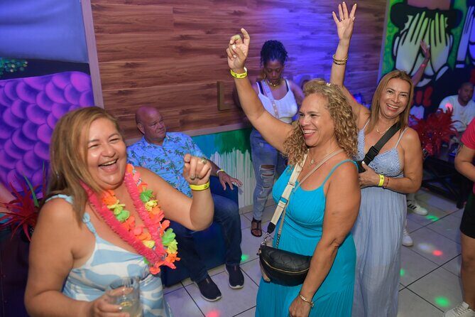 Latin Caribbean Sunset Party Bus tour with Karaoke - Practical Details: Transportation, Group Size, and Cost