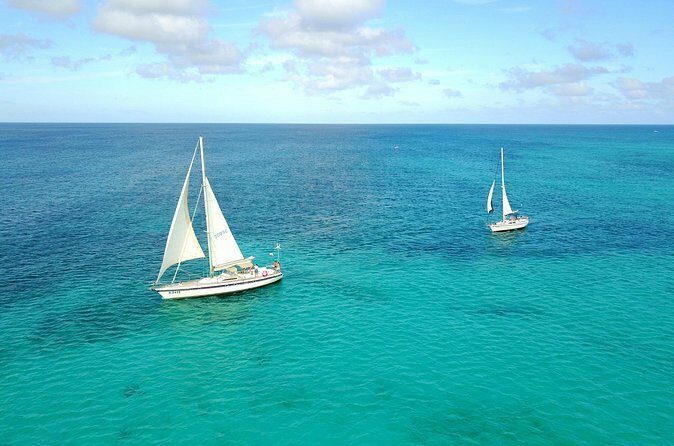 Coral Sunset Sail with 3 Course Dinner in Aruba - Why This Tour Stands Out